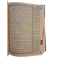 Kuran-i Kerim Rahle Boy open page with Arabic text and translation marks.